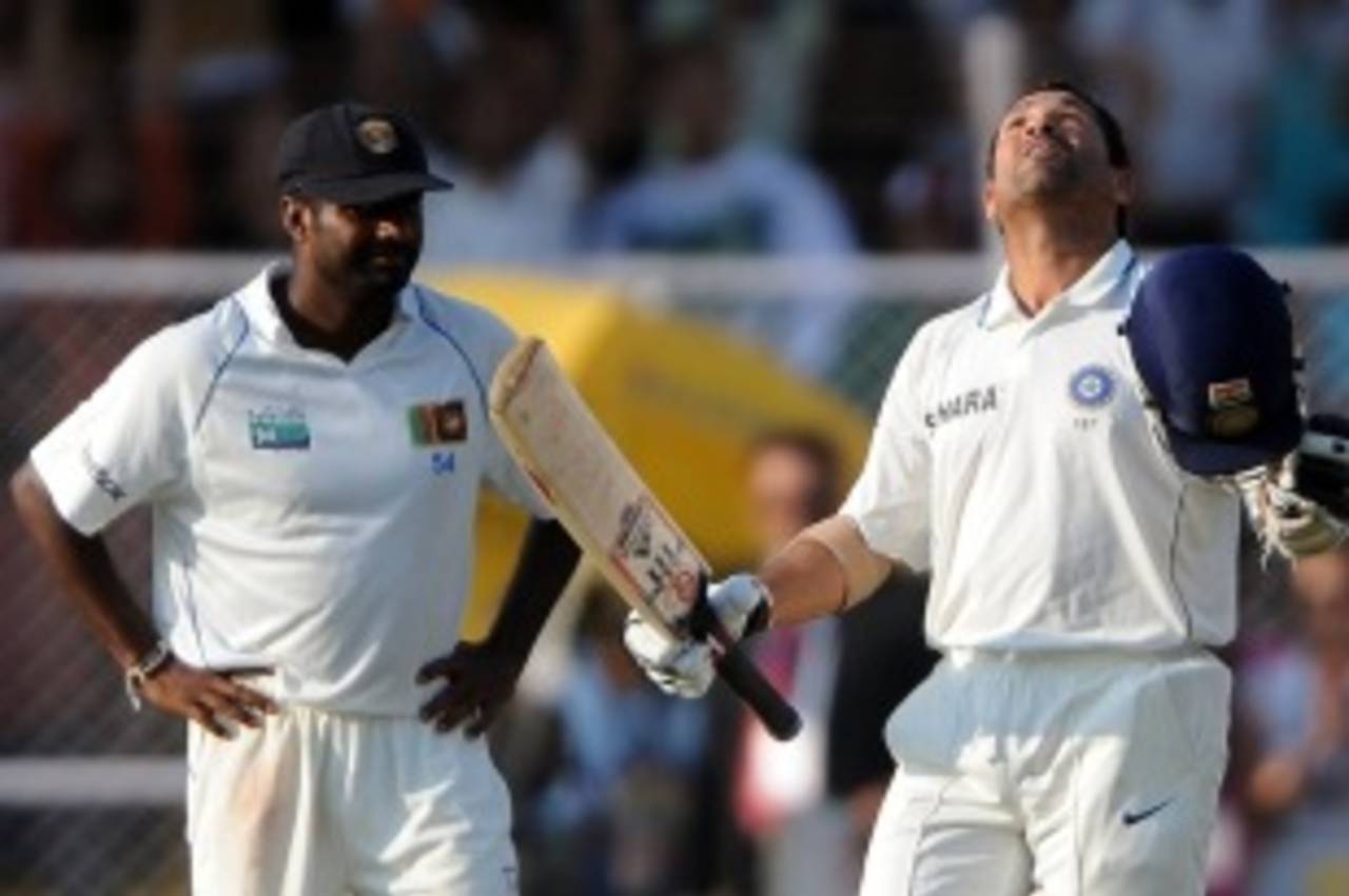 Contrasting emotions: Muttiah Muralitharan's silent frustration against Sachin Tendulkar's relief at reaching his match-saving century, India v Sri Lanka, 1st Test, Ahmedabad, 5th day, November 20, 2009 