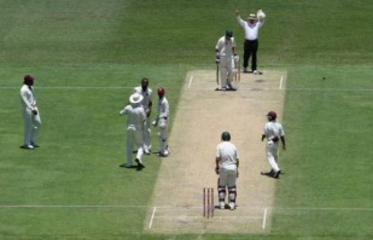 Ian Gould calls for a review after Mitchell Johnson challenged his caught-behind dismissal&nbsp;&nbsp;&bull;&nbsp;&nbsp;Getty Images