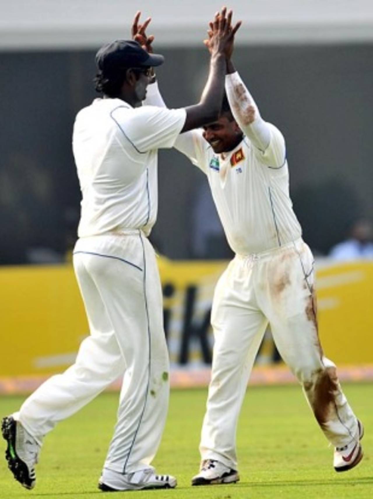 Angelo Mathews and Rangana Herath celebrate Yuvraj Singh's wicket, India v Sri Lanka, 3rd Test, Mumbai, 3rd day, December 4, 2009