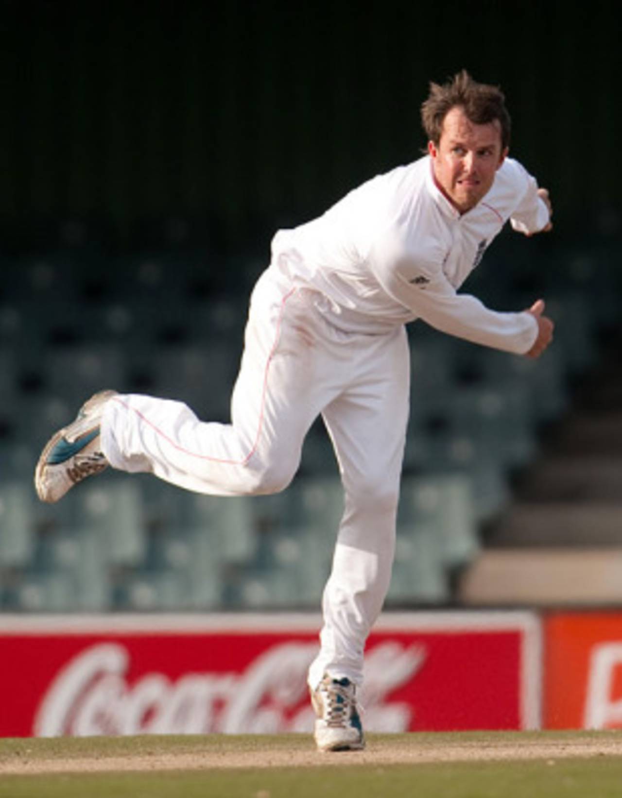 Graeme Swann bowls during his successful outing for England in their warm-up game, South African Invitational XI v England XI at East London, December 10, 2009 
