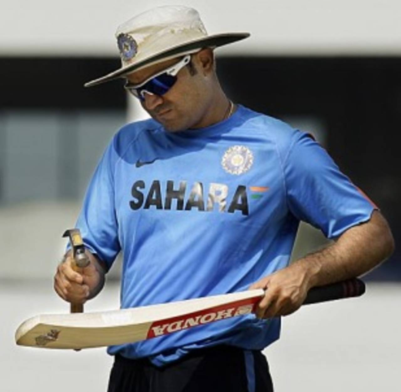 Virender Sehwag prepares his bat for another onslaught, Nagpur, December 17, 2009