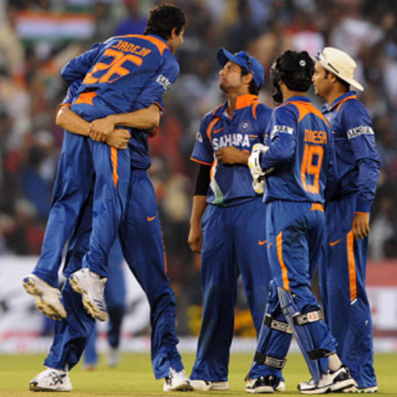 Ravindra Jadeja's team-mates congratulate him on one of his wickets&nbsp;&nbsp;&bull;&nbsp;&nbsp;AFP