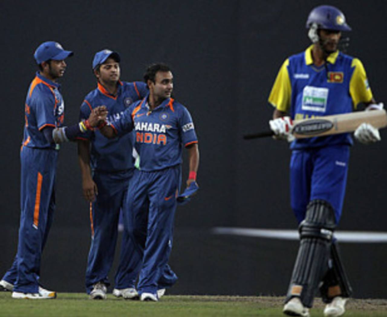 Amit Mishra is congratulated for dismissing Suraj Randiv, India v Sri Lanka, Tri-series, 5th ODI, Mirpur, January 10, 2010