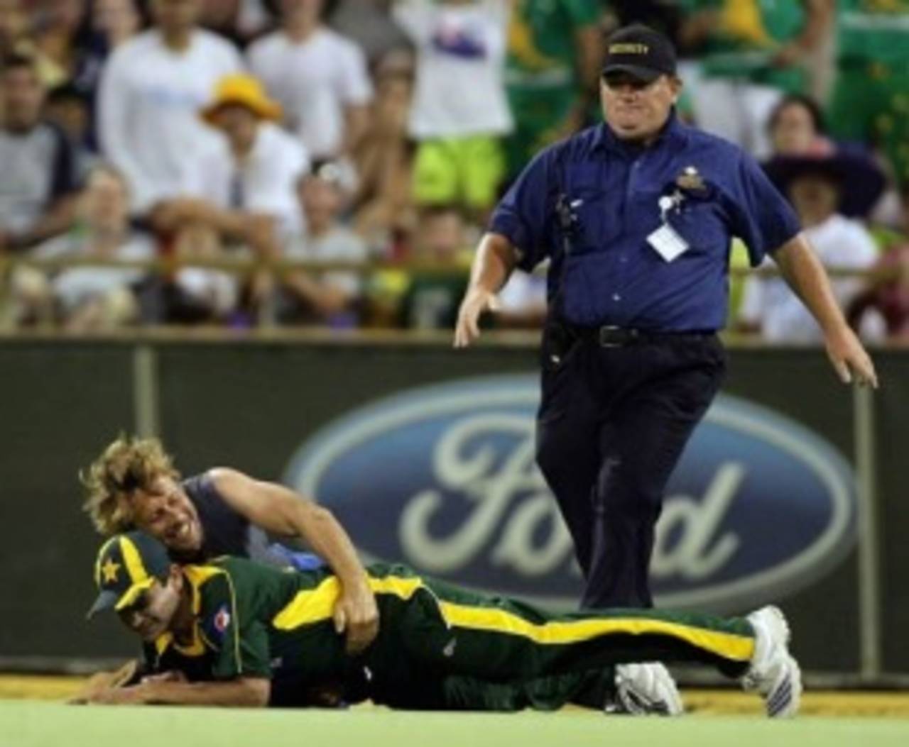 Khalid Latif is taken to the ground by a pitch invader, Australia v Pakistan, 5th ODI, Perth, January 31, 2010