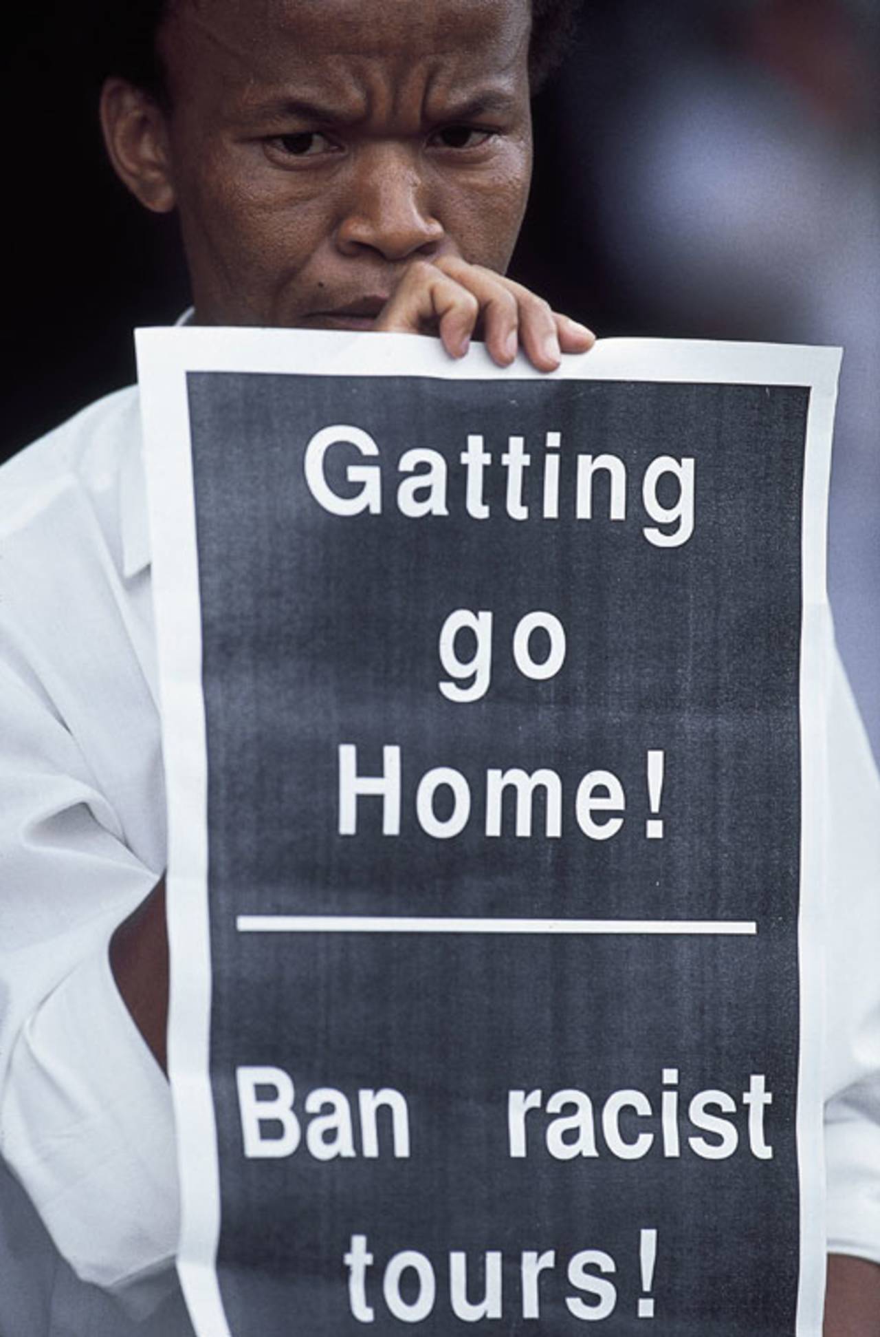 A fan protests during the rebel match between South Africa Universities and England XI&nbsp;&nbsp;&bull;&nbsp;&nbsp;Getty Images