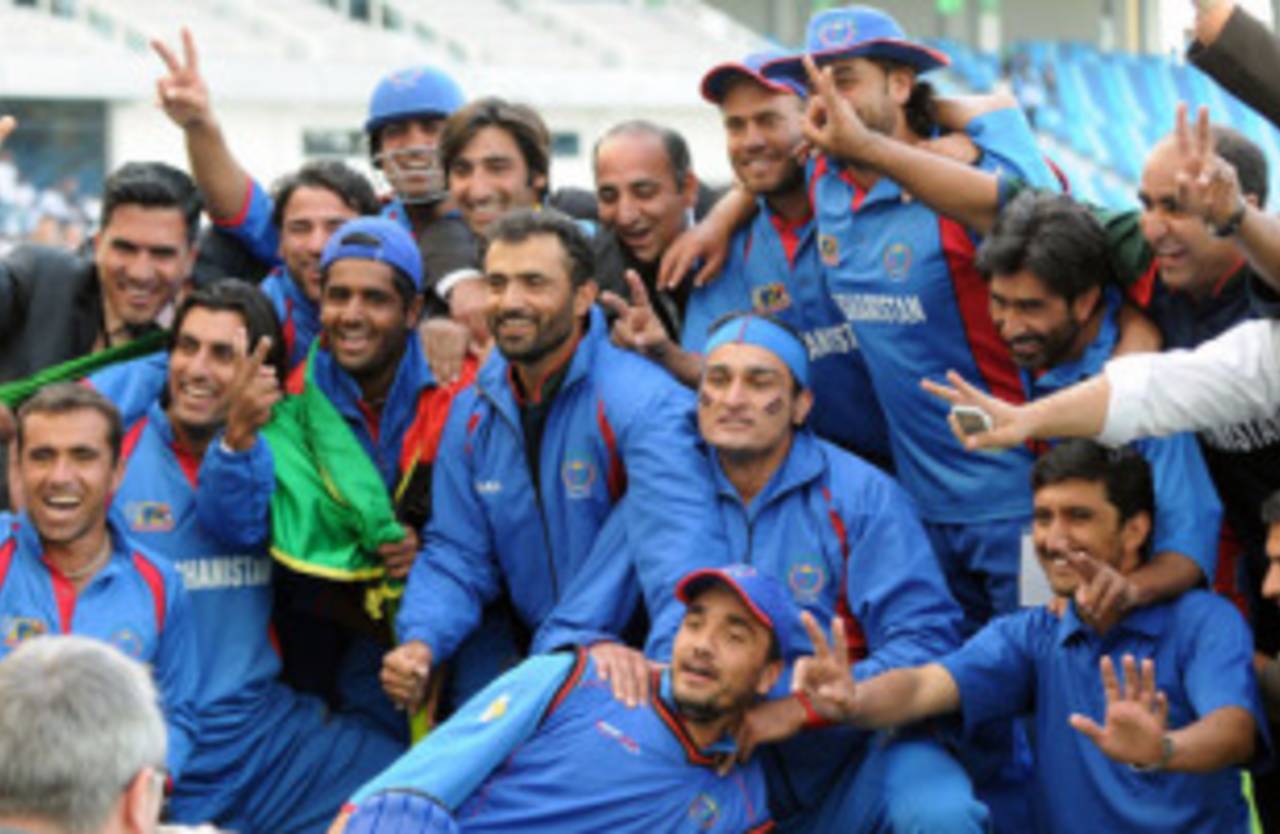 The victorious Afghanistan team strikes a happy pose, United Arab Emirates v Afghanistan, ICC World Twenty20 Qualifier, Super Four, Dubai, February 13, 2010