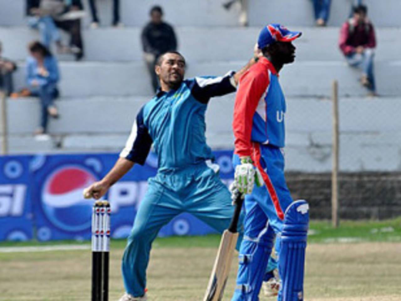 Lennox Cush is at the non-striker's end as Josefa Dabea bowls, Fiji v United States of America, ICC World Cricket League Division Five, Lalitpur, February 20, 2010