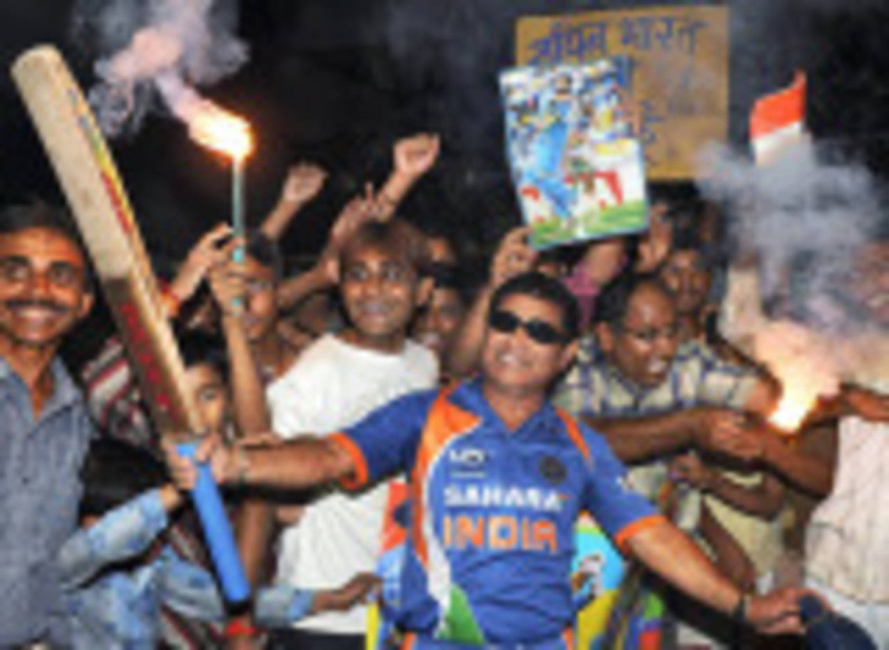 Fans celebrate Sachin Tendulkar's historic achievement, Ahmedabad, February 24, 2010