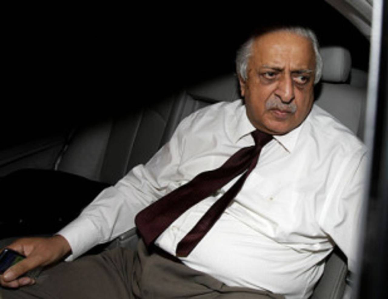 Ijaz Butt makes his way out of the PCB headquarters, Lahore, March 10, 2010