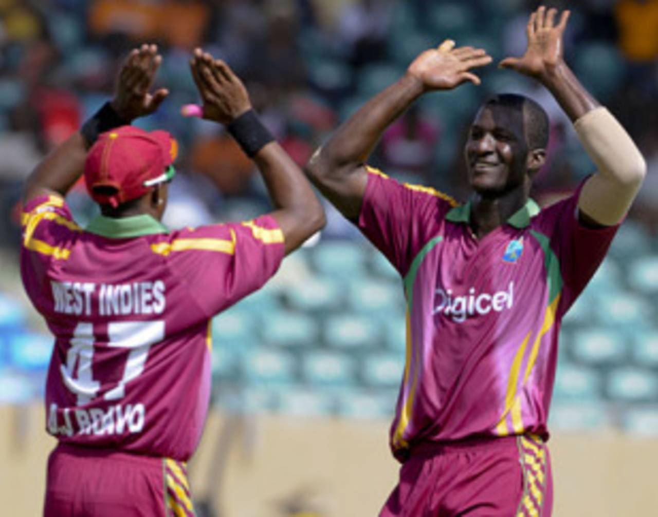 Darren Sammy gets the high-fives from Dwayne Bravo after picking up another wicket, West Indies v Zimbabwe, 3rd ODI, Kingstown, March 10, 2010