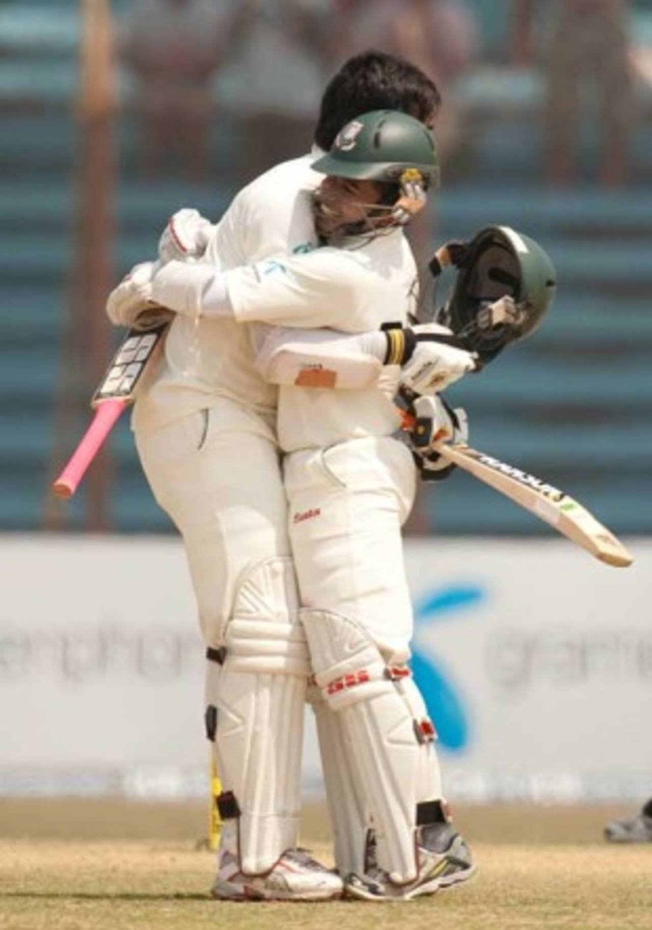 Mushfiqur Rahim hugs Junaid Siddique who had just reached his hundred, Bangladesh v England, 1st Test, Chittagong, March 16, 2010