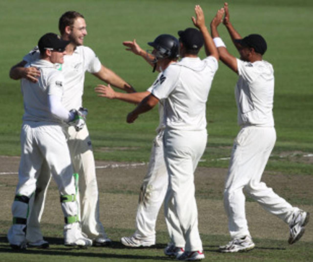 Daniel Vettori is surrounded after removing Mitchell Johnson, New Zealand v Australia, 2nd Test, Hamilton, 1st day, March 27, 2010