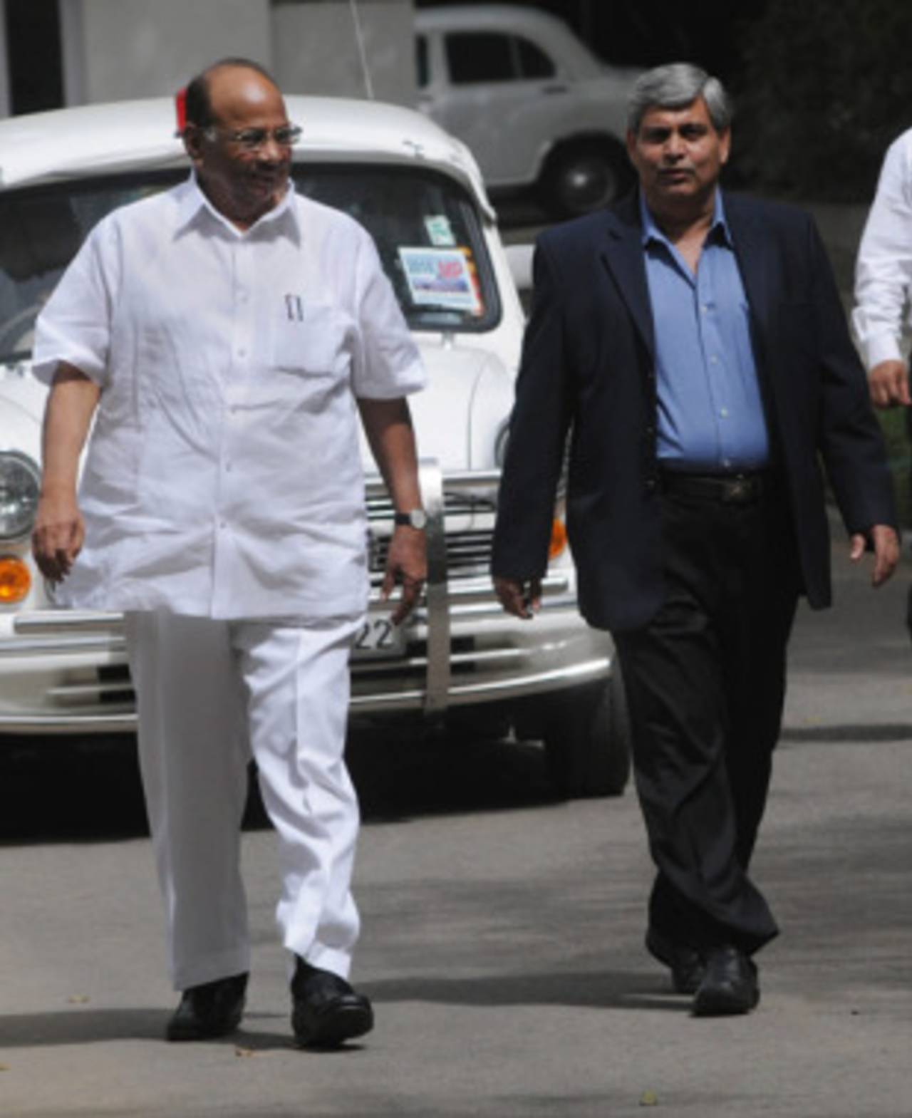Indian Minister of Agriculture Sharad Pawar and BCCI chief Shashank Manohar following a meeting at Pawar's residence in New Delhi, April 20, 2010