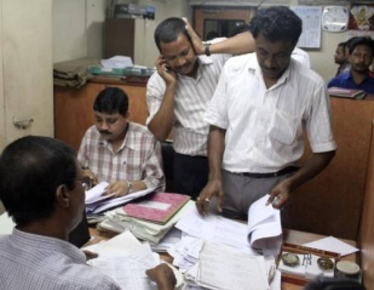 Income tax officials at the Cricket Association of Bengal office, Kolkata, April 21, 2010