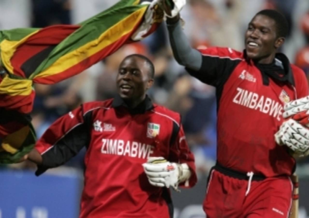The old and the new: Prosper Utseya and Elton Chigumbura celebrate Zimbabwe's win over Australia at the 2007 World Twenty20&nbsp;&nbsp;&bull;&nbsp;&nbsp;AFP