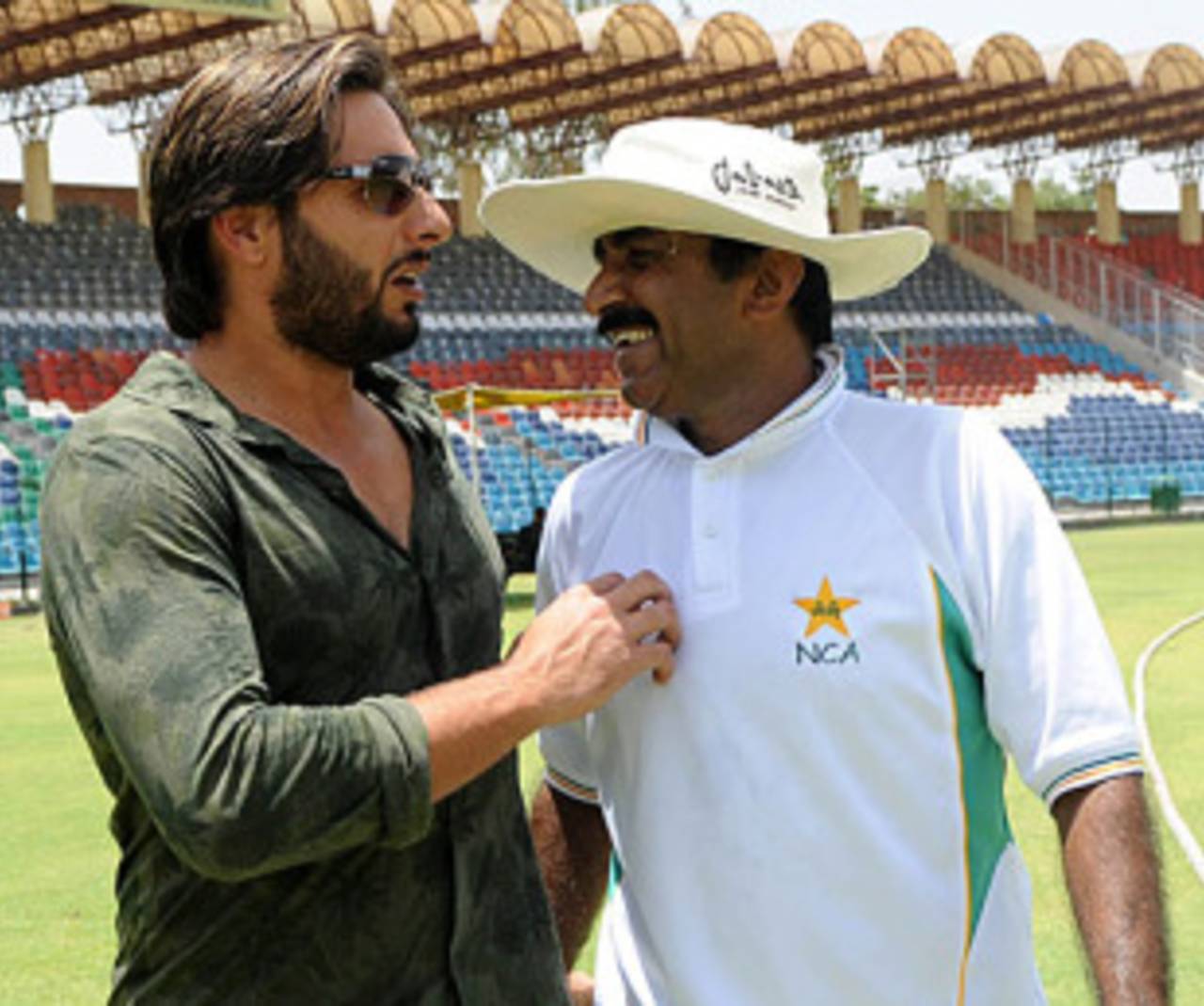 Shahid Afridi shares a light moment with Javed Miandad, Lahore, May 25, 2010
