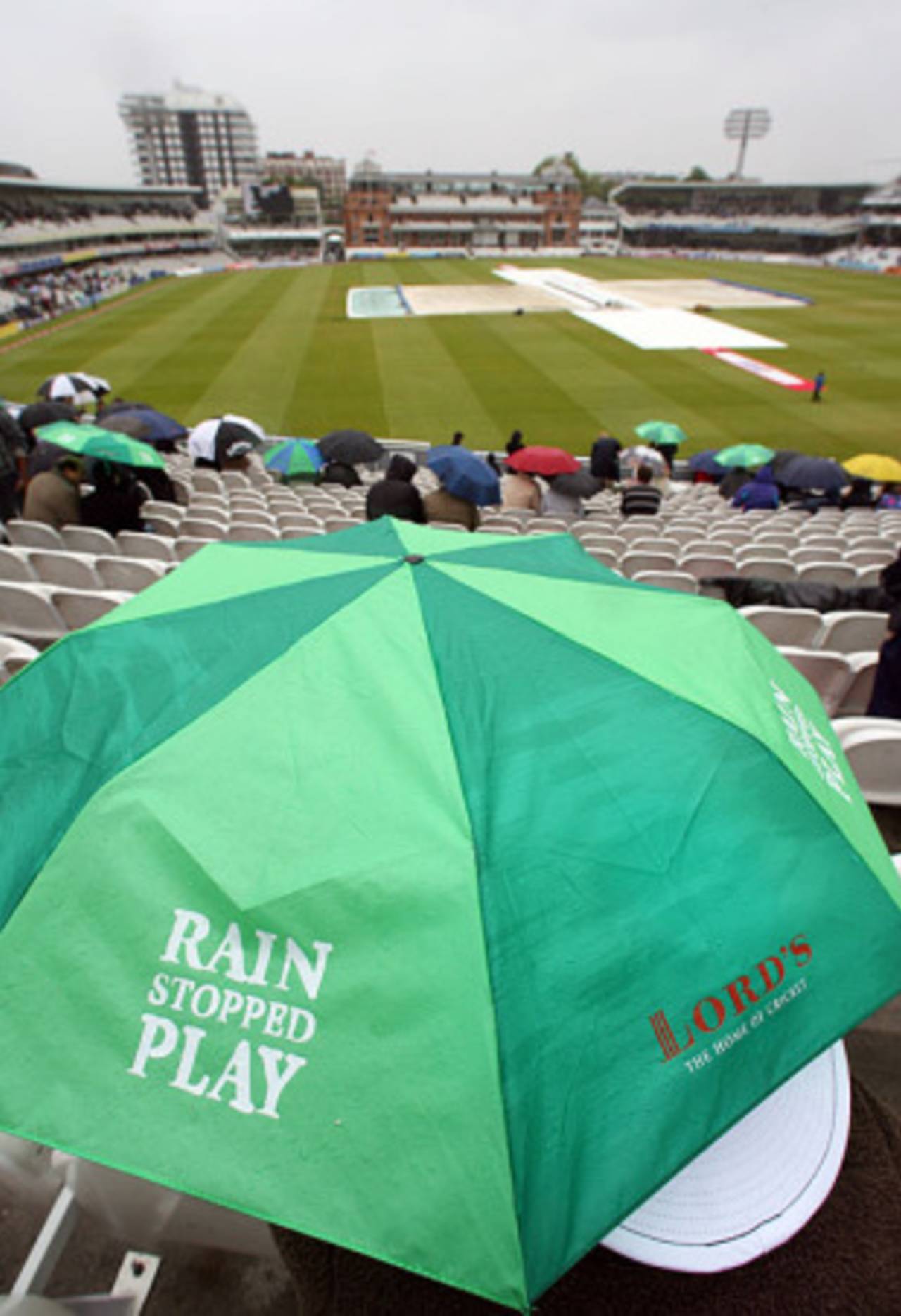 The umbrellas are out at Lord's, England v Bangladesh, 1st Test, Lord's, 3rd day, May 29, 2010