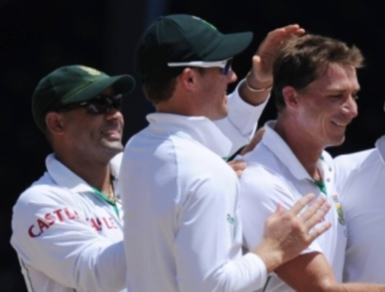 Steyn's team-mates surreptitiously pull hairs out of his head for future use while pretending to celebrate a wicket&nbsp;&nbsp;&bull;&nbsp;&nbsp;AFP