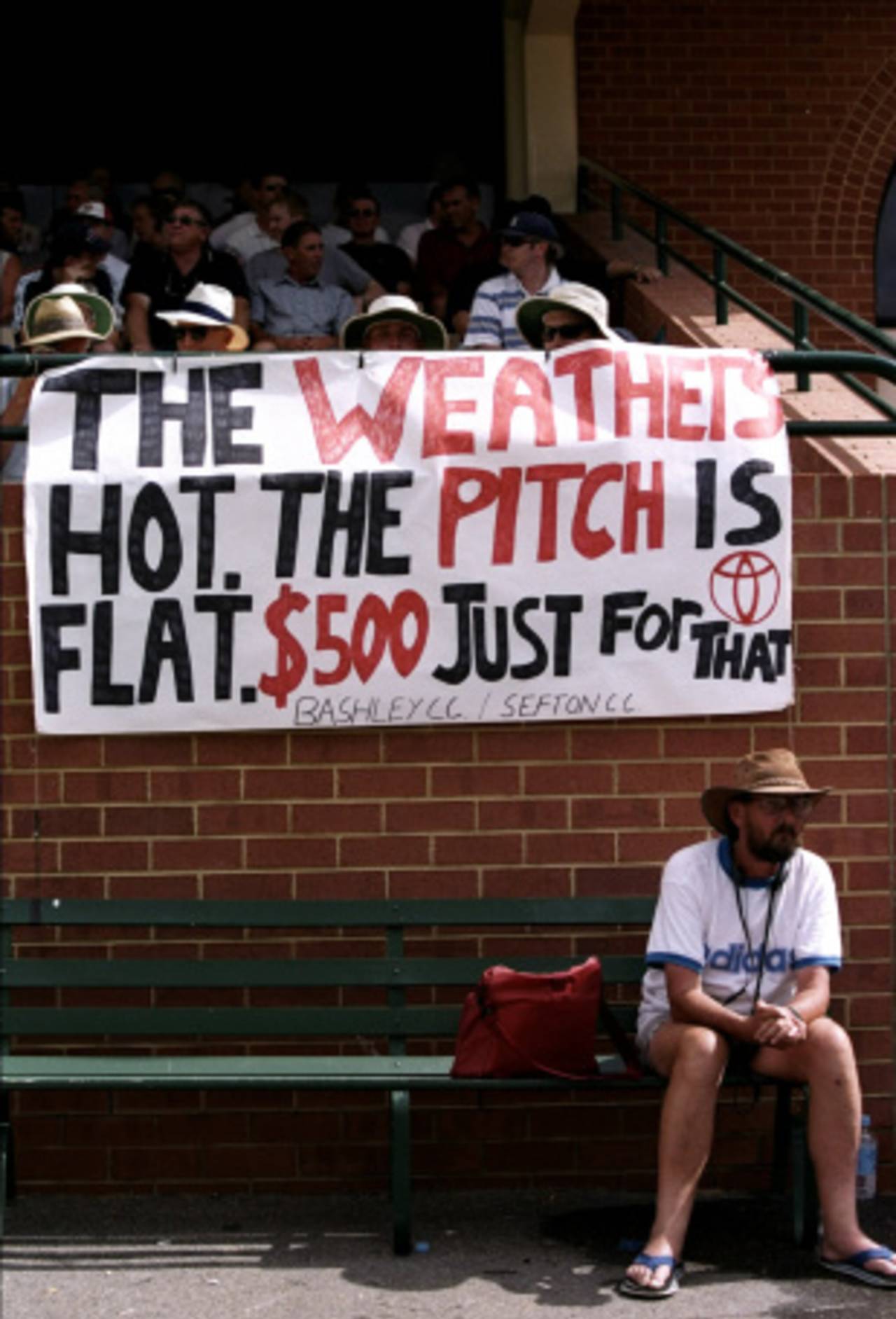 Spectators display a banner referring to the betting scandal involving Mark Waugh and Shane Warne, third Test, Australia v England, Adelaide, 11 December 1998