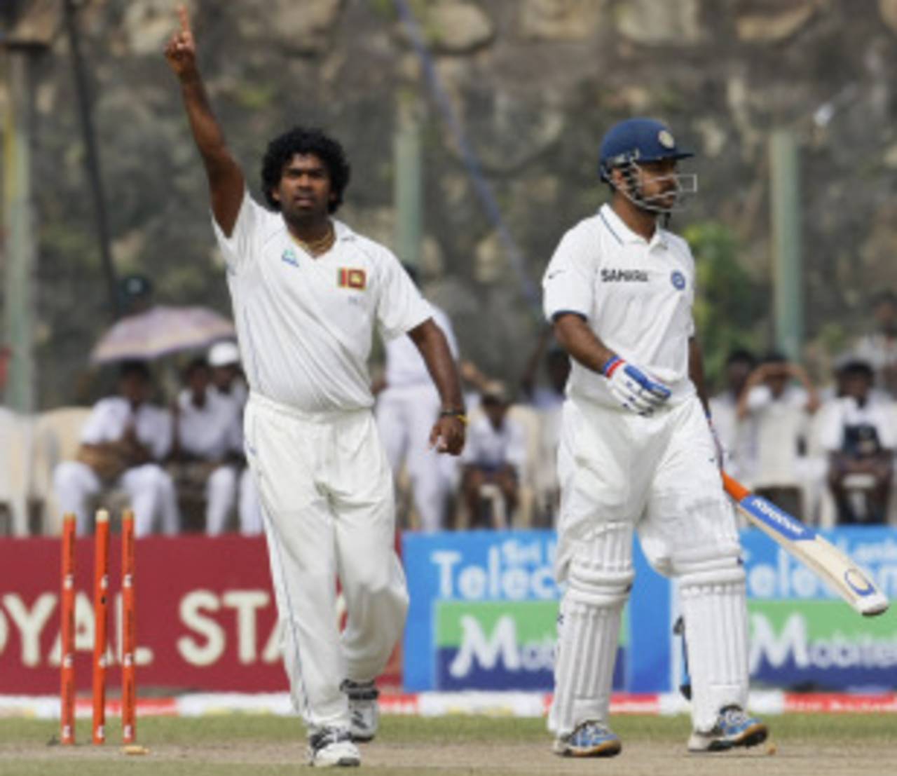 Lasith Malinga cleans up MS Dhoni in his first over of the day, Sri Lanka v India, 1st Test, Galle, 5th day, July 22, 2010