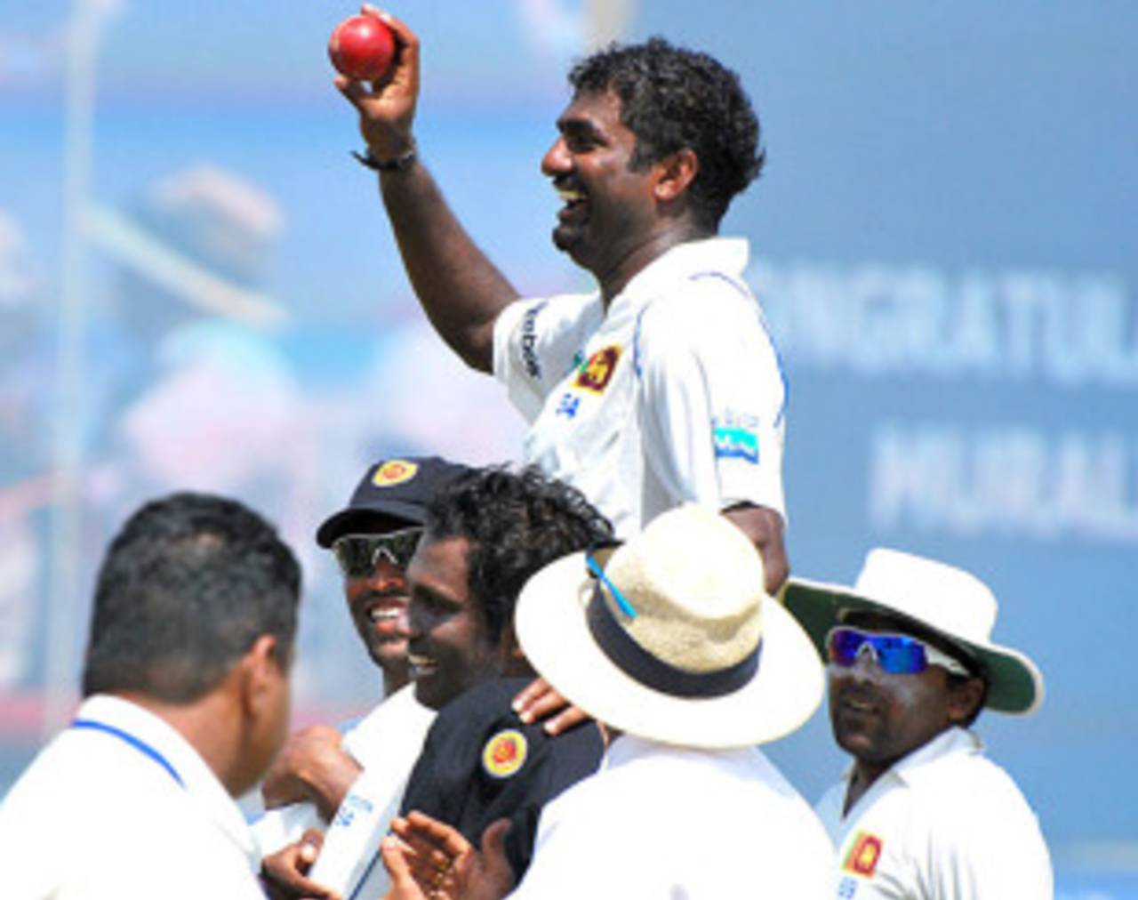 Muttiah Muralitharan's team-mates lift him on their shoulders as he leaves the field, Sri Lanka v India, 1st Test, Galle, 5th day, July 22, 2010