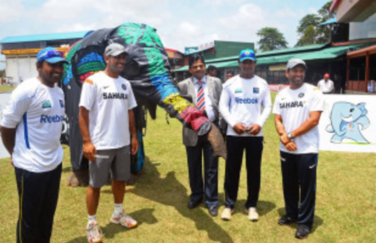 World Cup 2011 director Ratnakar Shetty poses with India and Sri Lanka players during the launch of the tournament mascot 'Stumpy', Colombo, August 2, 2010
