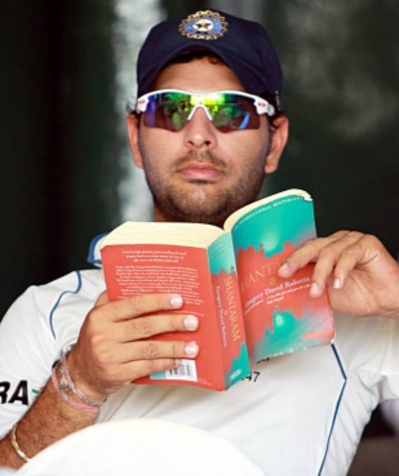 Yuvraj Singh reads a book, Sri Lanka v India, 3rd Test, P Sara Oval, 4th day, August 6, 2010