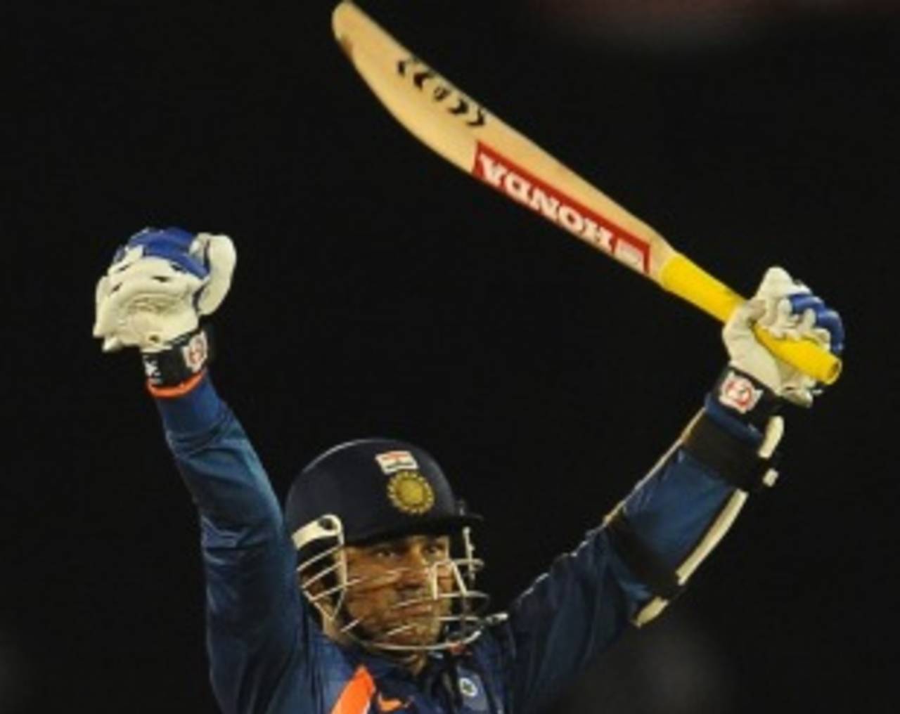 Virender Sehwag raises his arms after the victory, Sri Lanka v India, tri-series, 3rd ODI, Dambulla, August 16, 2010
