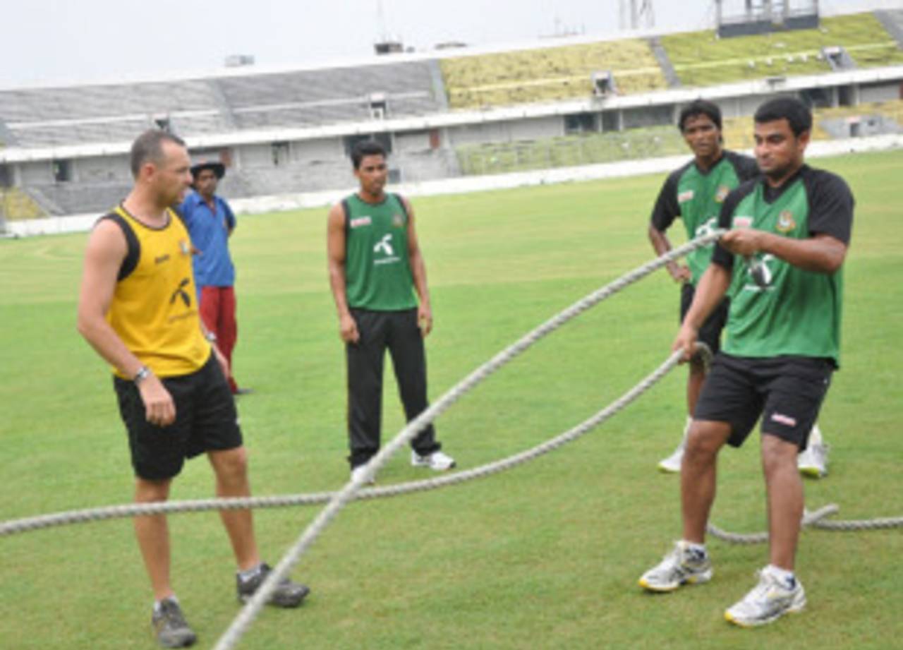 Tamim Iqbal during strength training as fitness coach Grant Trafford Luden looks on, Dhaka, August 25, 2010