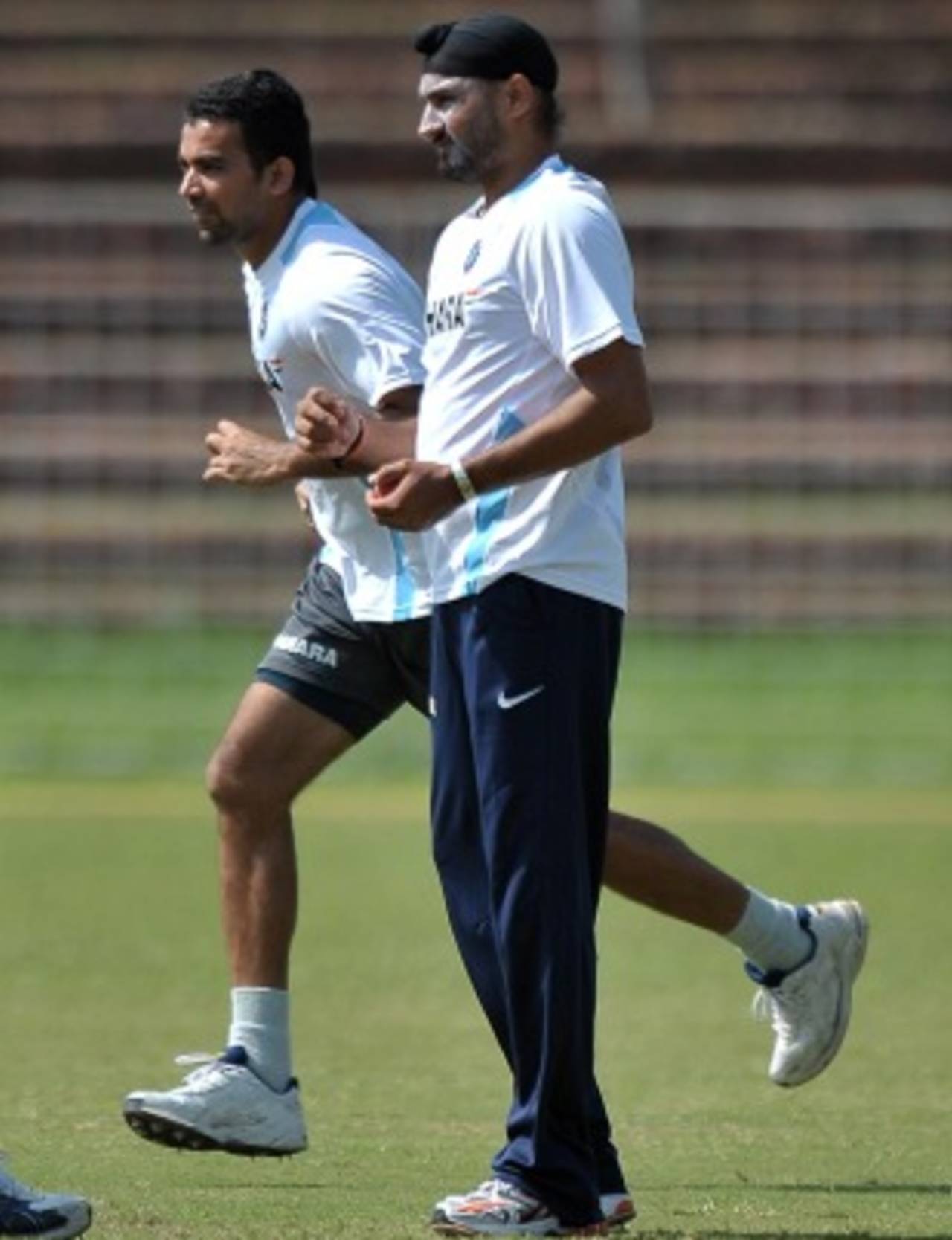 Zaheer Khan and Harbhajan Singh gear up to bowl, Mohali, September 28, 2010