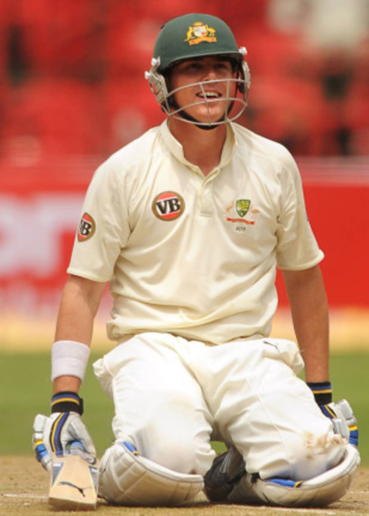 Marcus North sinks to the ground to relish his century, India v Australia, 2nd Test, Bangalore, 2nd day, October 10, 2010