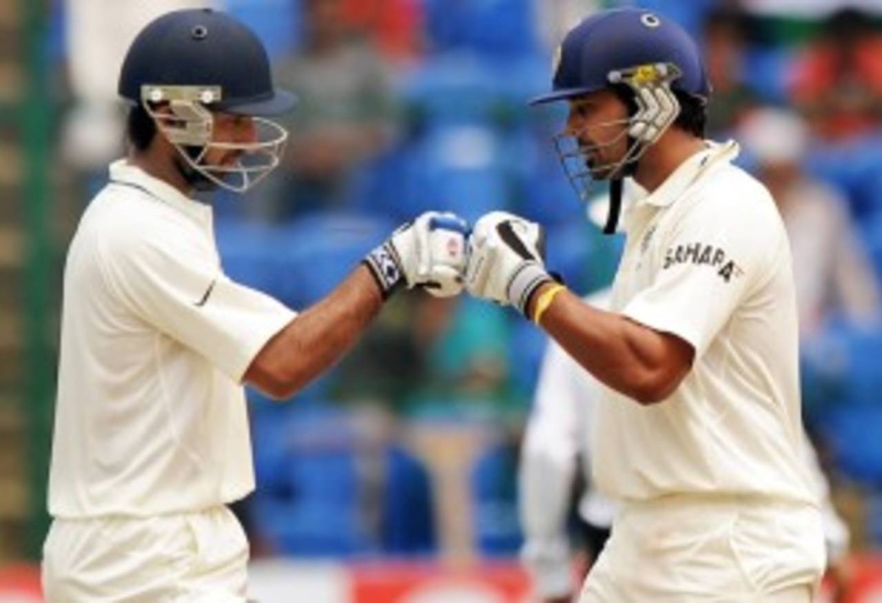 M Vijay and Cheteshwar Pujara punch gloves during their partnership, India v Australia, 2nd Test, Bangalore, 5th day, October 13, 2010