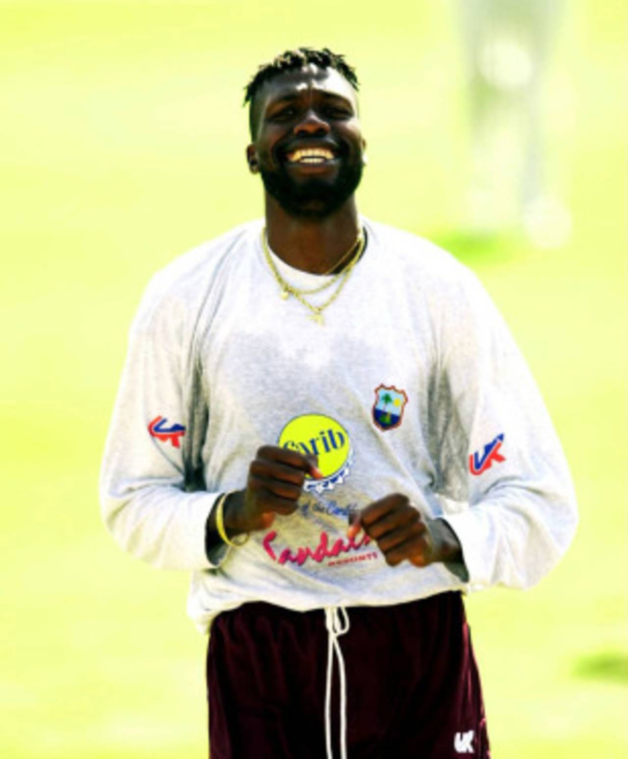 Curtly Ambrose of the West Indies has a laugh with one of the batsmen during the nets session, The Oval, August 29, 2000