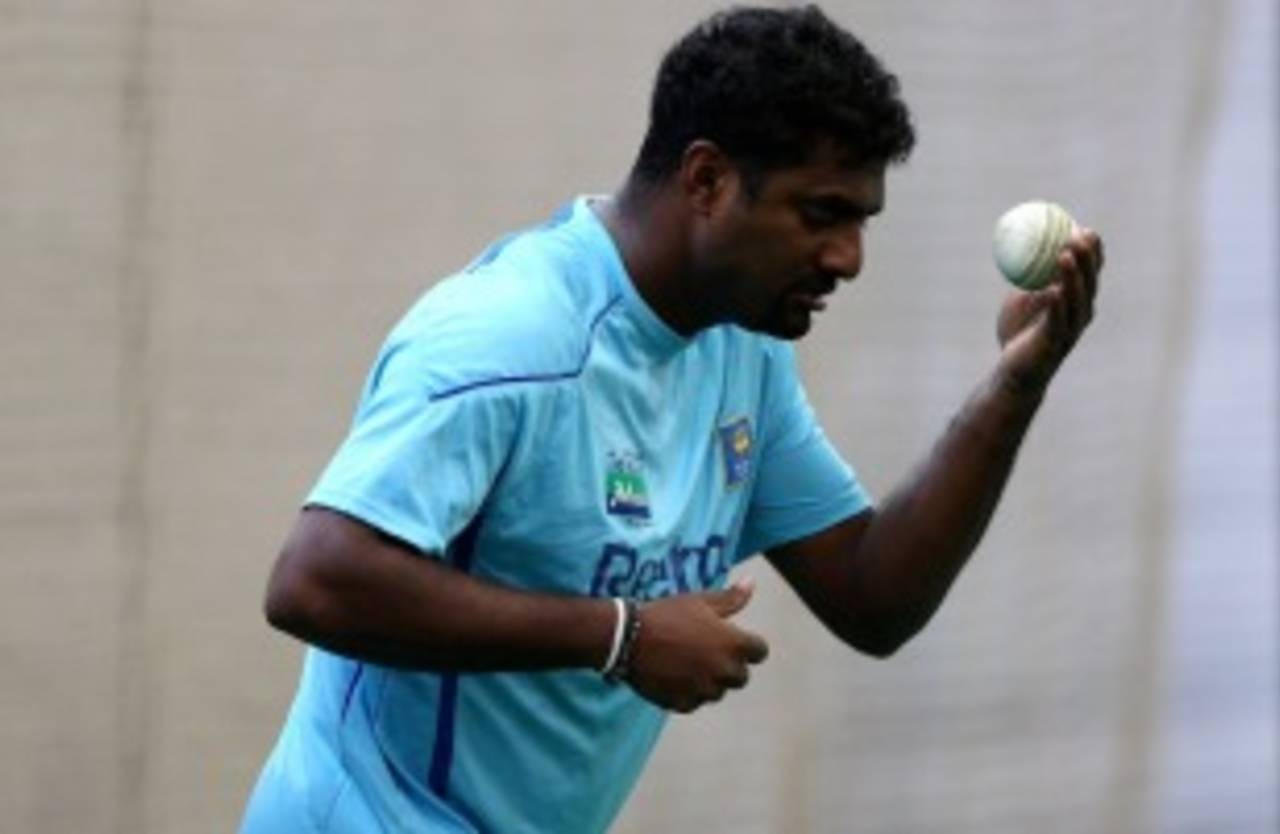 Muttiah Muralitharan prepares to bowl, New South Wales v Sri Lanka, Sydney, October 24, 2010