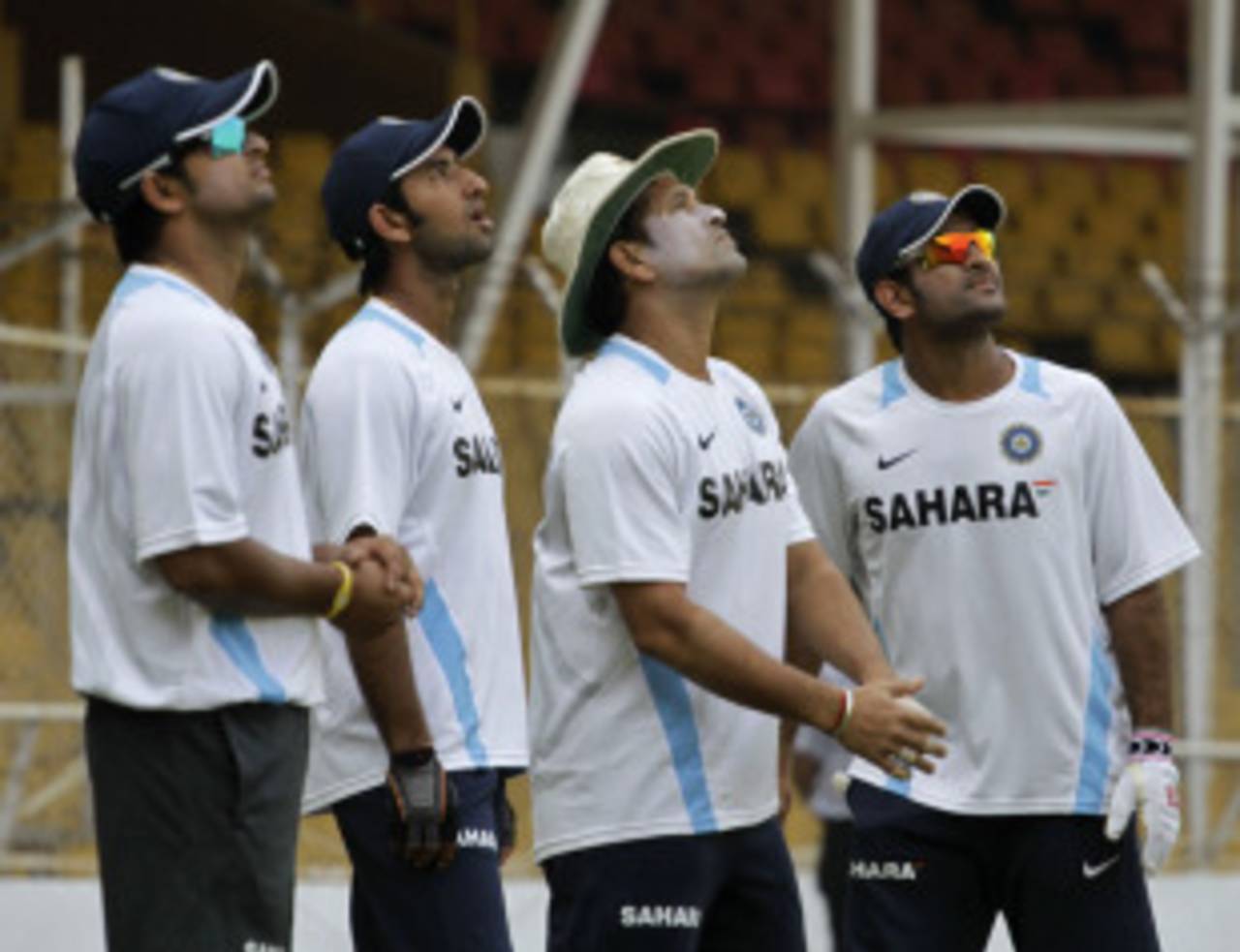 Suresh Raina, Cheteshwar Pujara, Sachin Tendulkar and MS Dhoni watch a ball during a training session, Ahmedabad, November 2, 2010