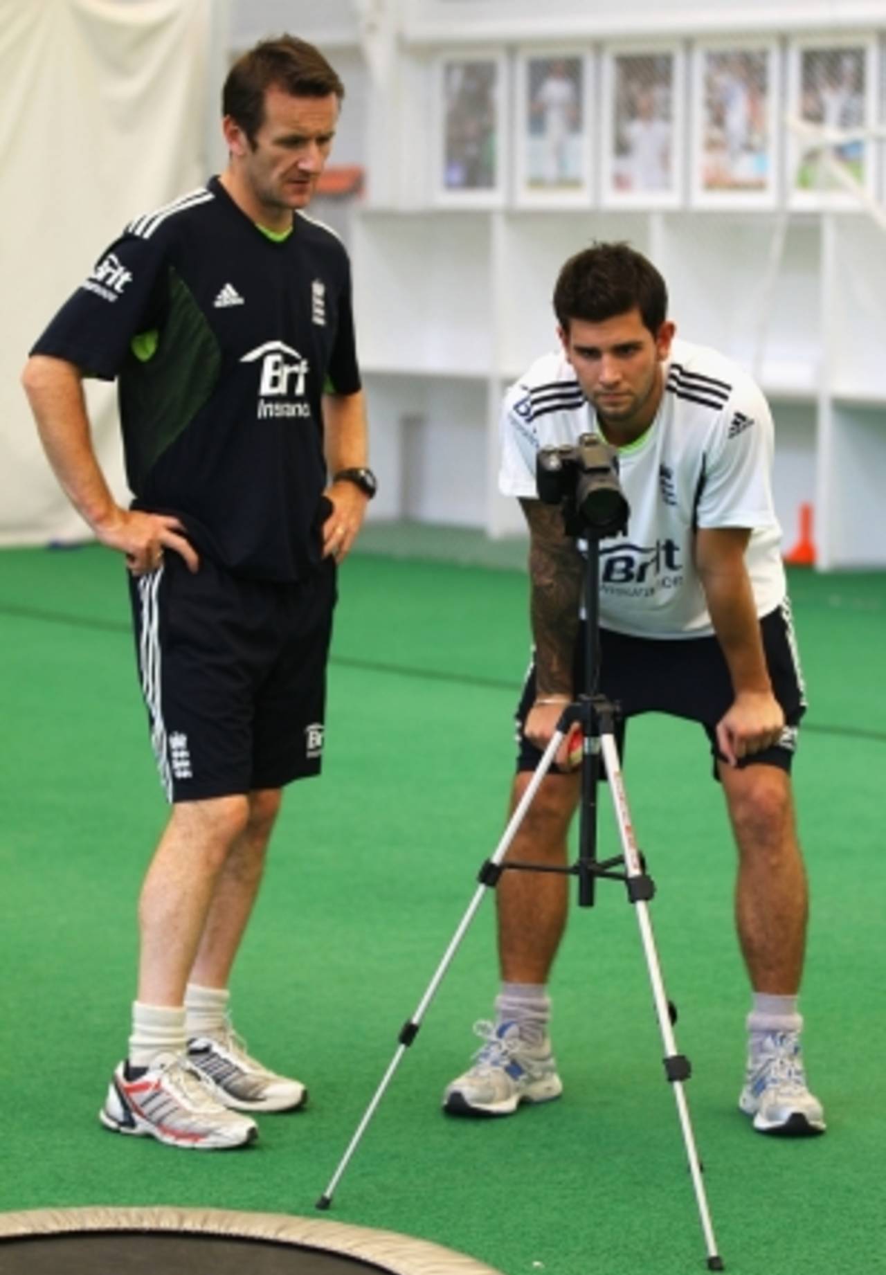 Jade Dernbach and bowling coach Kevin Shine review a video of Dernbach's bowling during an England Performance Programme training session, Loughborough, November 5 2010