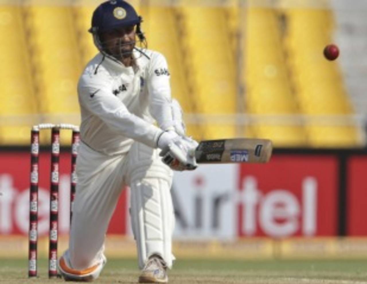 Harbhajan Singh slog sweeps during his half-century, India v New Zealand, 1st Test, Ahmedabad, 5th day, November 8, 2010