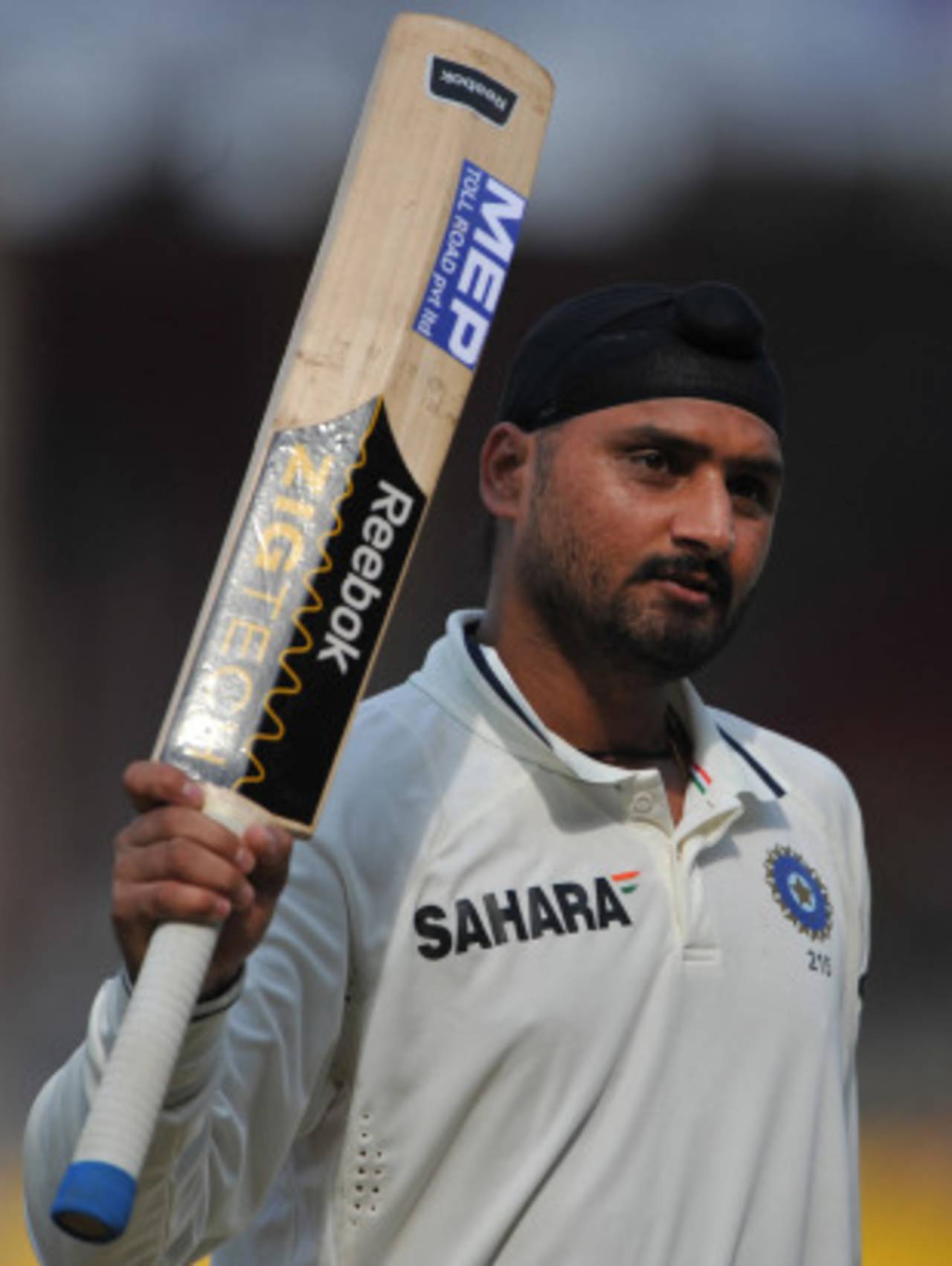 Harbhajan Singh after reaching his maiden Test century, India v New Zealand, 1st Test, Ahmedabad, 5th day, November 8, 2010