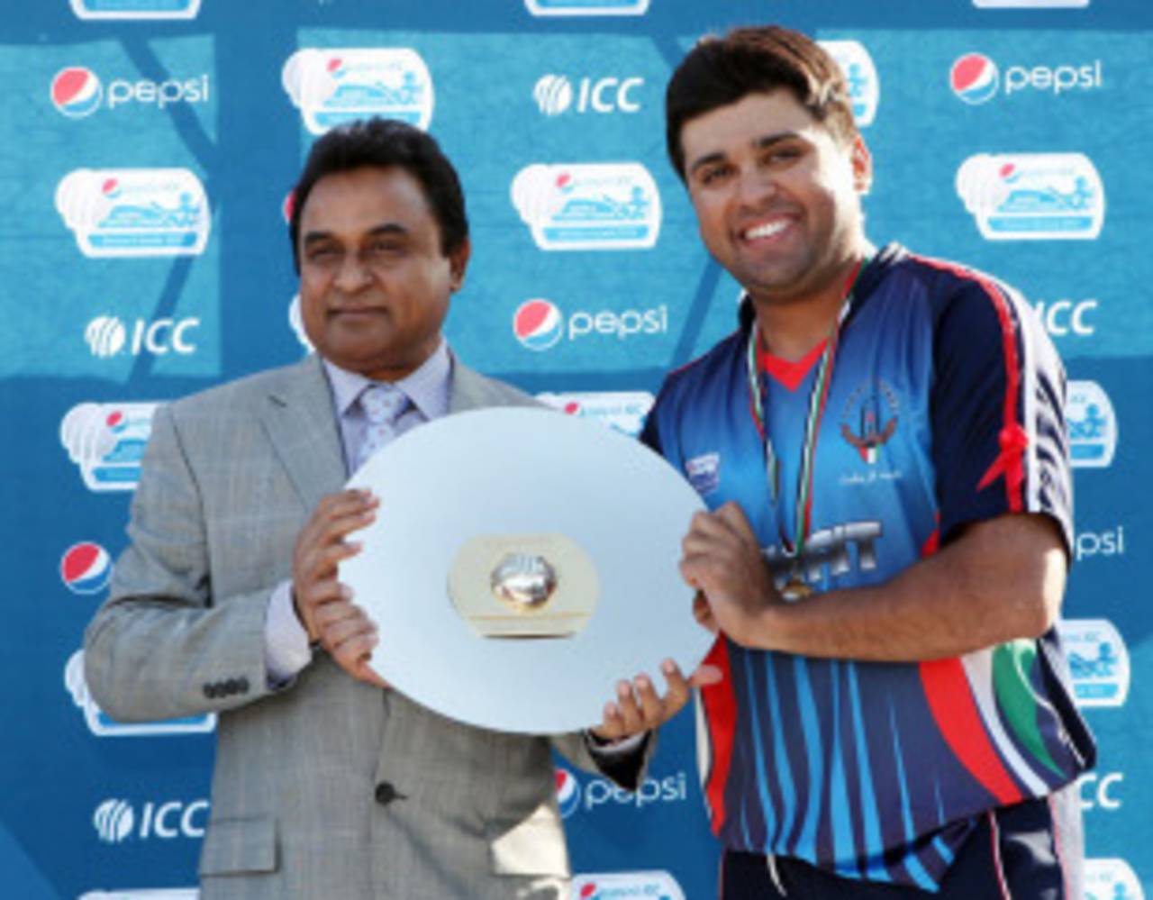 Hisham Mirza receives the WCL Division Eight trophy from ICC board director Mustafa Kamal, Kuwait v Germany, WCL Division 8 Final, Ahmadi City, November 12, 2010