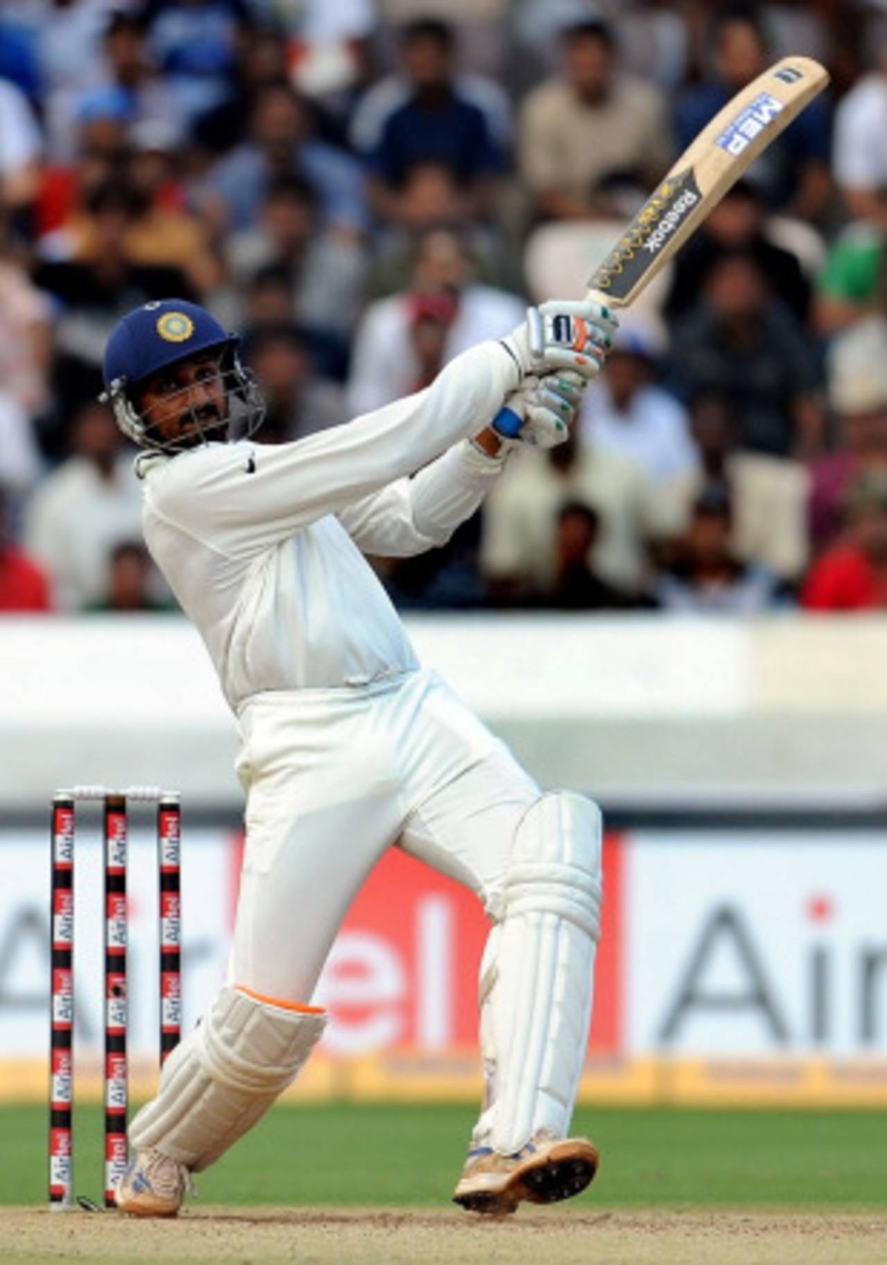 Harbhajan Singh powers the ball down the ground, India v New Zealand, 2nd Test, Hyderabad, 3rd day, November 14, 2010