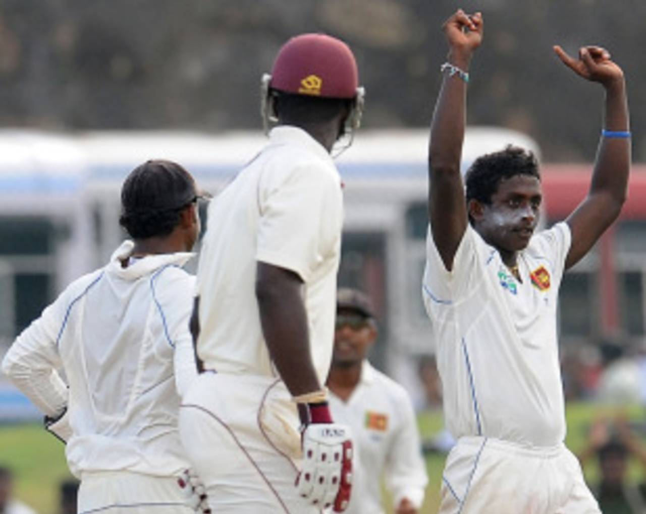 Ajantha Mendis celebrates the dismissal of West Indies captain Darren Sammy, Sri Lanka v West Indies, 1st Test, Galle, 2nd day, November 16, 2010