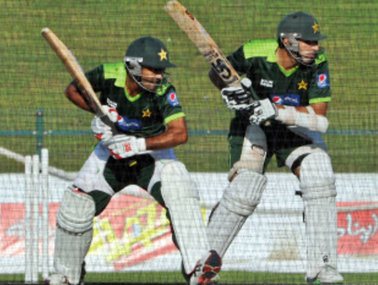 Misbah-ul-Haq and Asad Shafiq practice ahead of the 2nd Test against South Africa, Abu Dhabi,  November 18, 2010