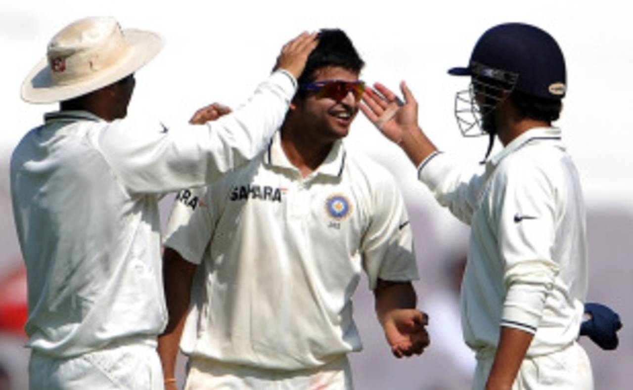 Suresh Raina is congratulated after he dismissed Daniel Vettori for 13, India v New Zealand, 3rd Test, Nagpur, 4th day, November 23, 2010