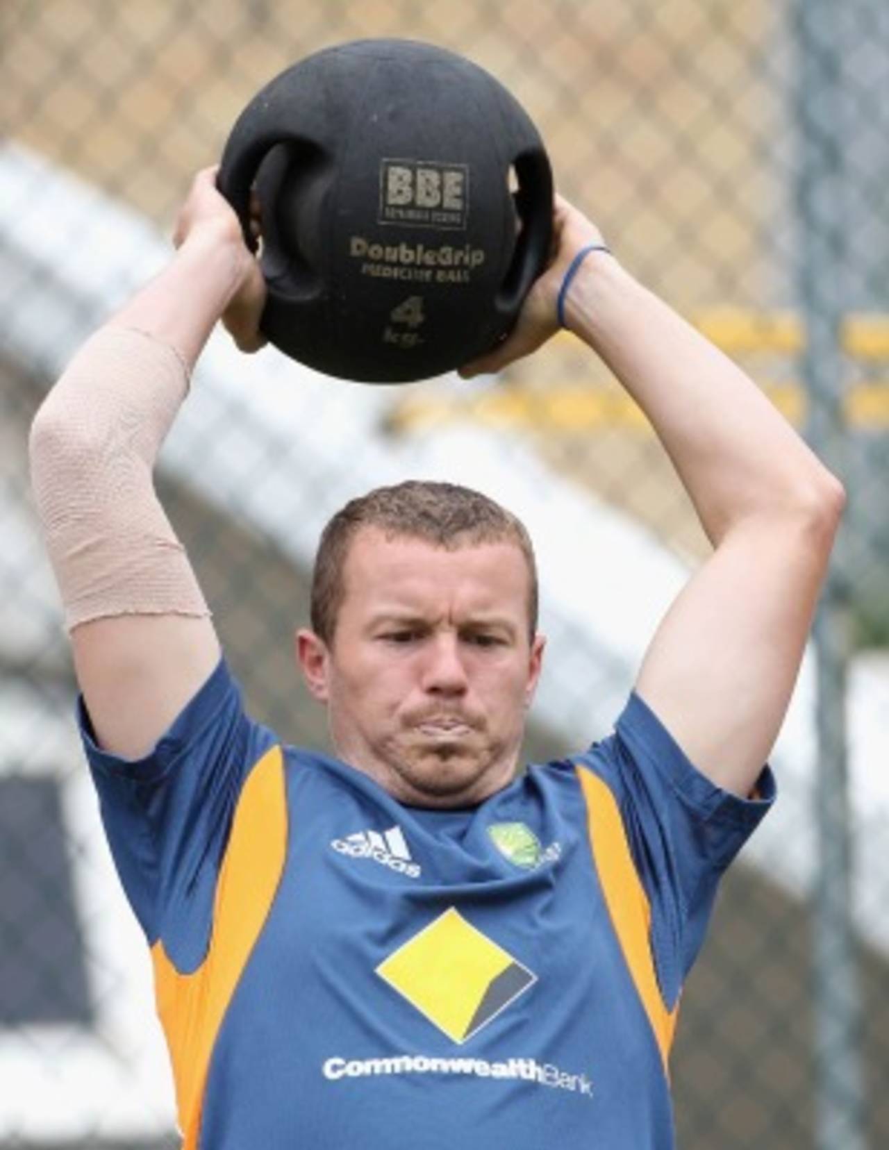Peter Siddle does some fitness work at Australia's training session, Brisbane, November 24, 2010