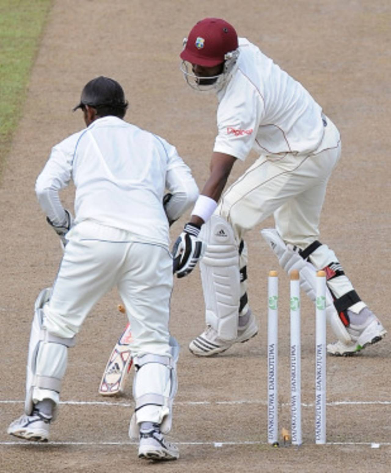 Rangana Herath proved perseverance pays by continuing to toss the ball up to Dwayne Bravo and getting him stumped&nbsp;&nbsp;&bull;&nbsp;&nbsp;AFP