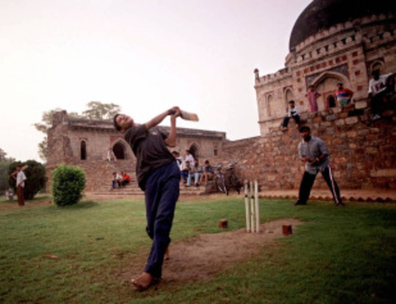 Kids play cricket at the Lodhi Gardens, Delhi, May 15, 2000
