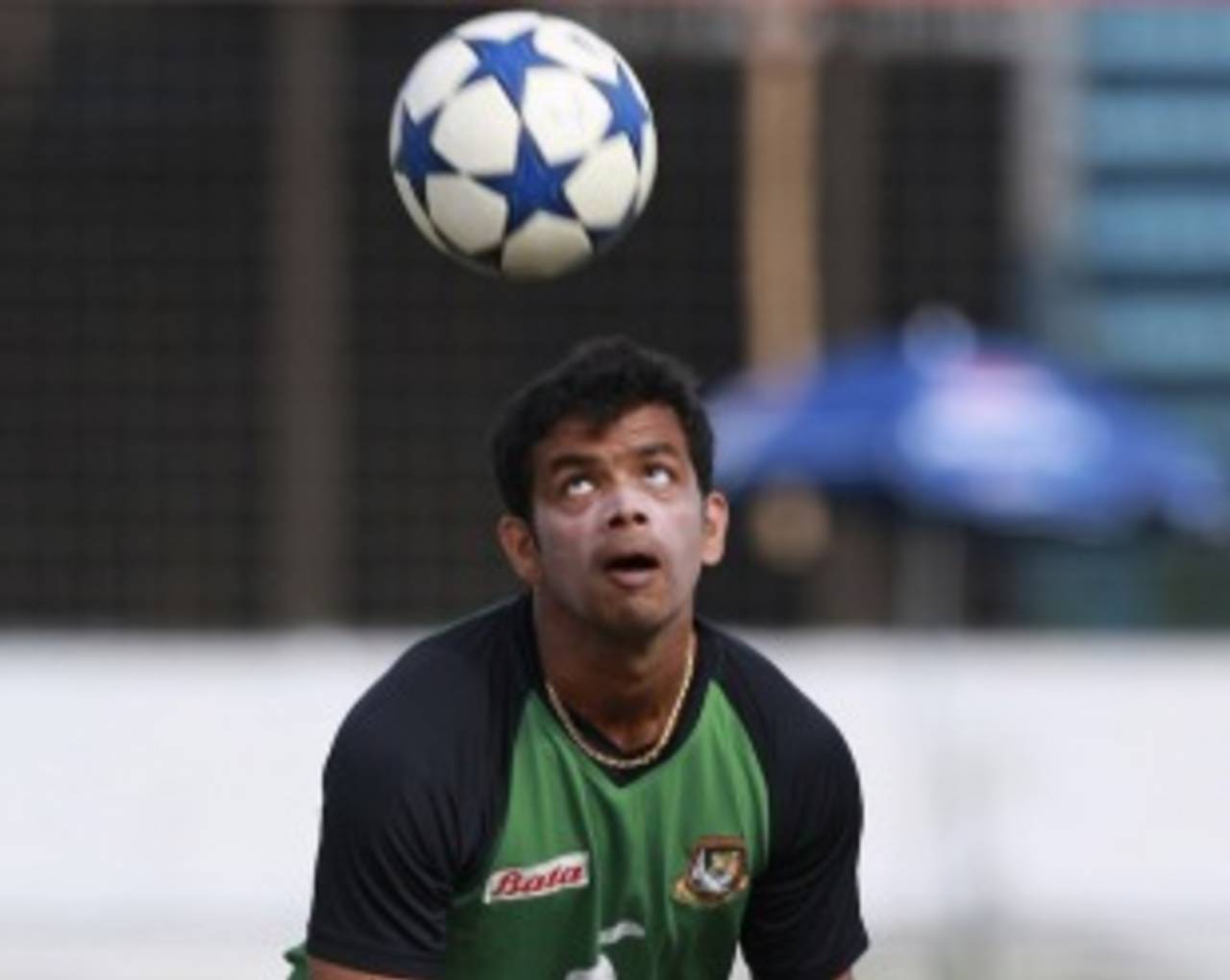Abdur Razzak keeps his eyes on the football, Chittagong, December 8, 2010