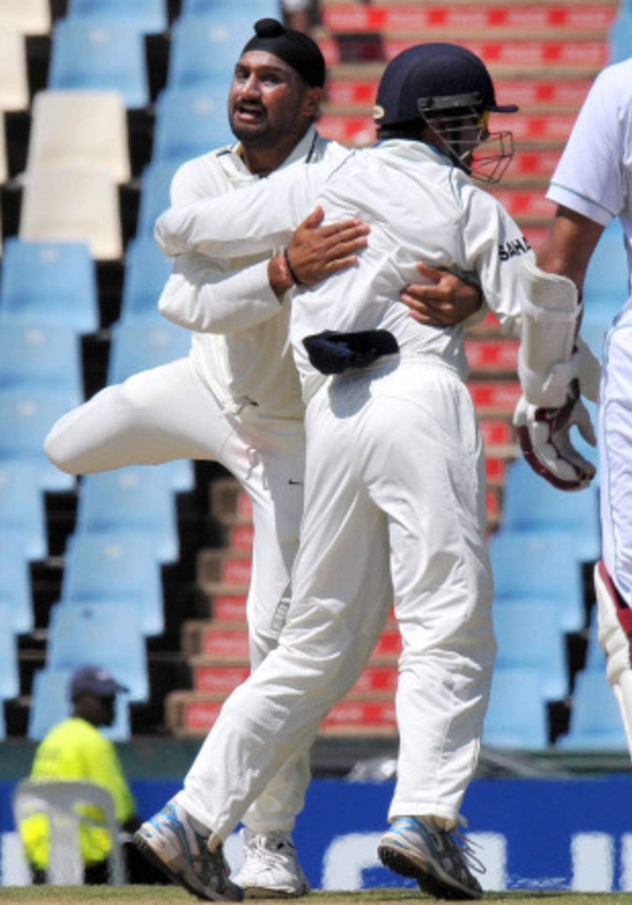 Harbhajan Singh and Gautam Gambhir celebrate the fall of Alviro Petersen, South Africa v India, 1st Test, Centurion, 2nd day, December 17, 2010 