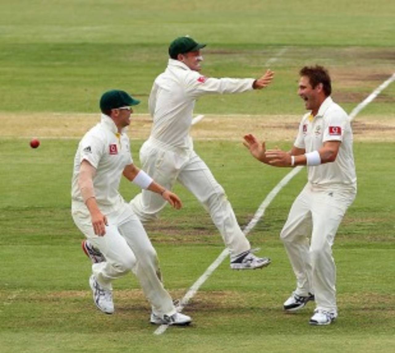 The Australians race towards Ryan Harris after another wicket, Australia v England, 3rd Test, Perth, 4th day, December 19, 2010