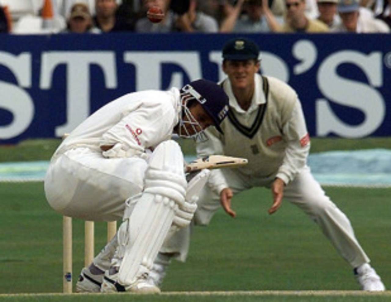 Mark Butcher ducks a short ball as Brian McMillan looks on from the slips, England v South Africa, 5th Test, 3rd day, August 8, 1998
